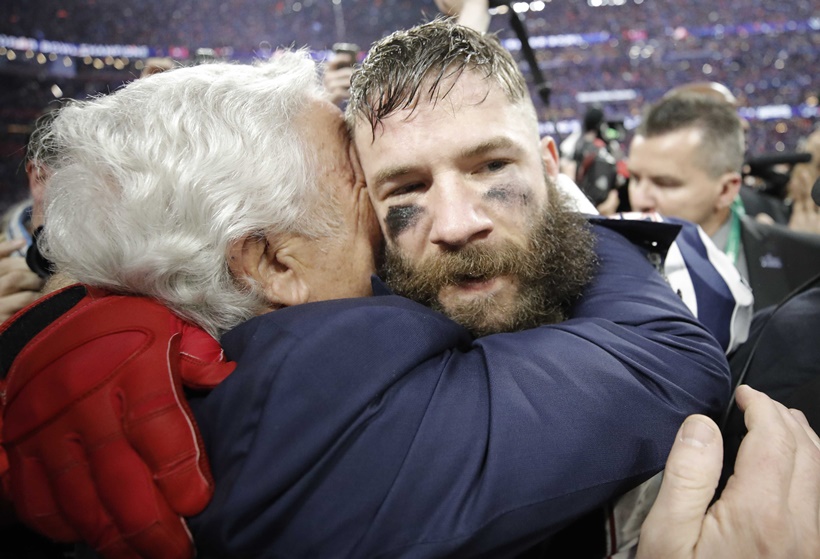 New England Patriots' Julian Edelman celebrates with New England Patriots owner Robert Kraft after winning Super Bowl LIII.