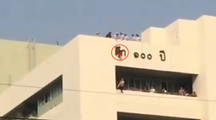 Thailand, Thailand hospital, four year old hangs hospital roof, kid hangs hospital roof, toddler rescued hospital roof, viral video