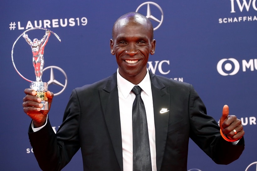 Eliud Kipchoge poses after winning the Exceptional Achievement Award
