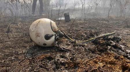 A helmet is seen lying near the site. (Reuters)