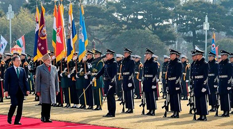 Prime Minister Narendra Modi with South Korean President Moon Jae-in (L), inspects the guard of honour during a ceremonial reception, in Seoul. (PIB/PTI)