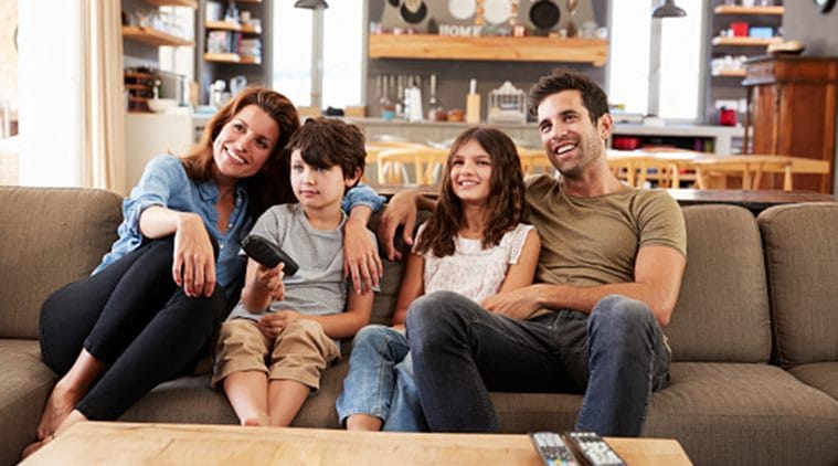 child watching movie with parents