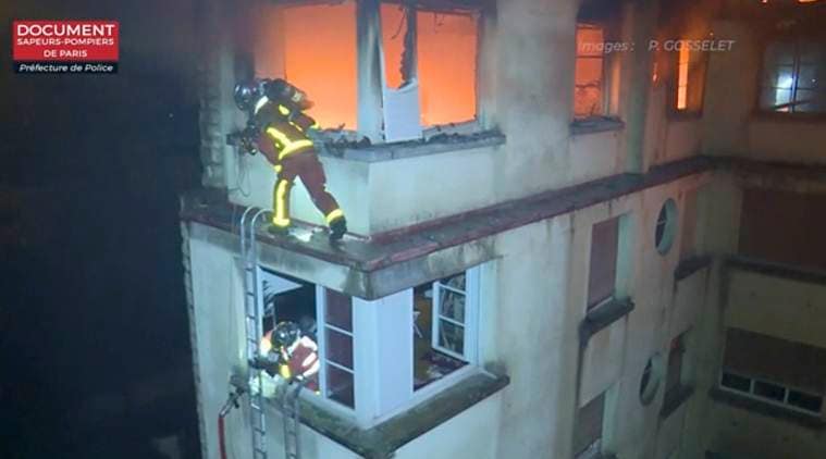 Paris fire kills eight in apartment block, woman detained