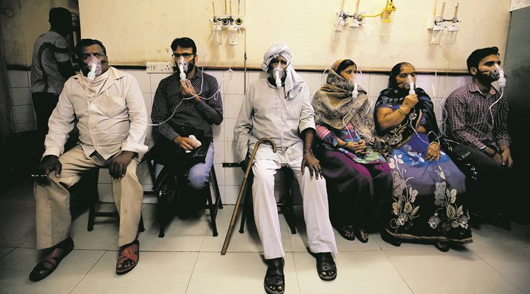 indian express, indian express journalists, indian express photojournalists, tashi tobgyal, praveen khanna, shalini nair, hindu photojournalism awards, chennai, chennai photo biennale, manual scavenging, manual scavengers, pollution, delhi pollution, pollution in delhi, patients, indian express news
