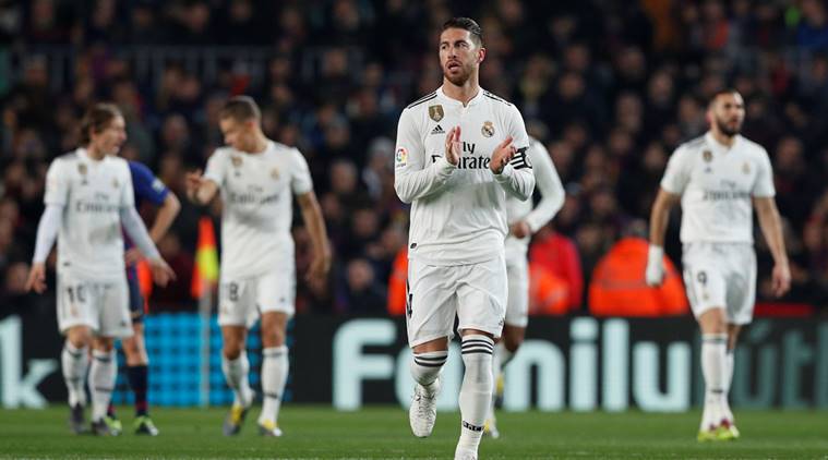 Real Madrid's Sergio Ramos and team mates celebrate their first goal scored by Lucas Vazquez against Barcelona