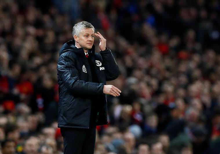 Manchester United interim manager Ole Gunnar Solskjaer gestures during the game against PSG
