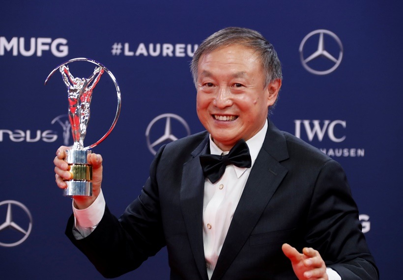 Xia Boyu poses as he celebrates winning the Sporting Moment of the Year award