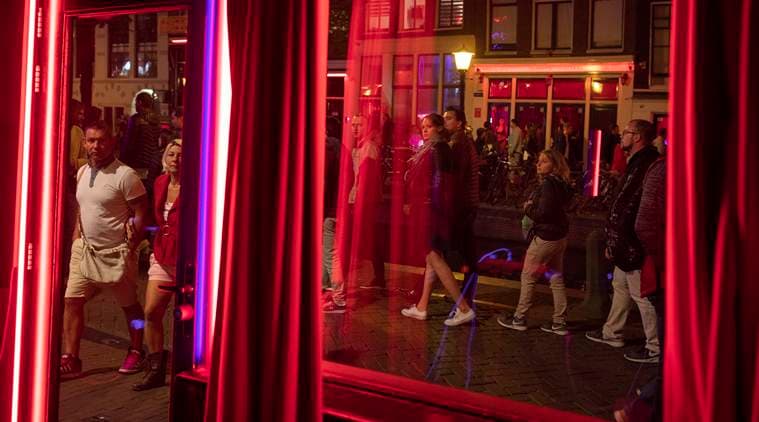 Amsterdam is to ban tours of the red-light district