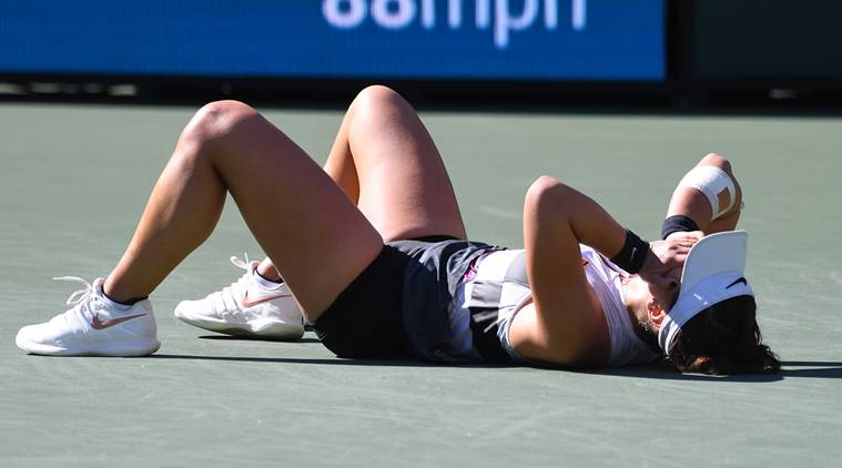 Bianca Andreescu (CAN) reacts at match point as she defeats Angelique Kerber (not pictured) in the final match of the BNP Paribas Open at the Indian Wells Tennis Garden.