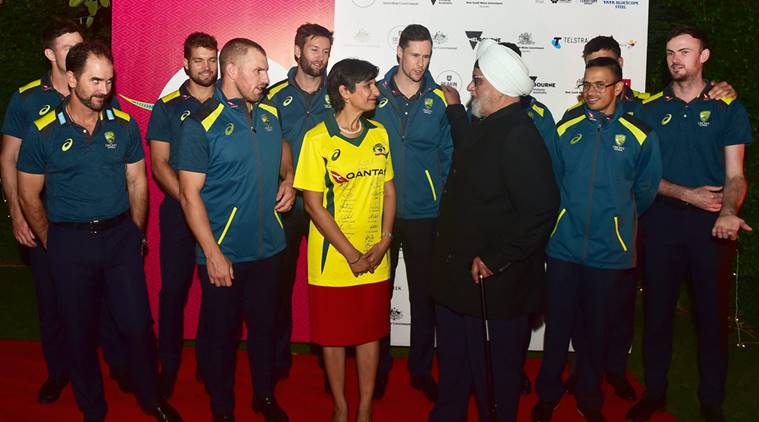Former India cricket captain Bishan Singh Bedi interacts with the Australian cricket team players as Australian High Commissioner to India Harinder Sidhu looks on during a reception hosted by Australian High Commissioner, in New Delhi
