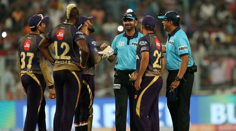 KKR players with the umpire during the IPL fixture against KXIP