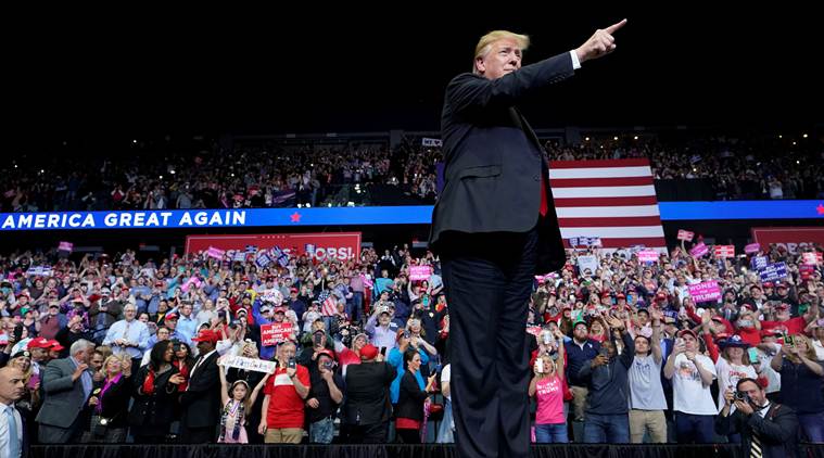 At rally, President Donald Trump says Russia probe backers tried to steal power illegally
