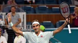 Roger Federer of Switzerland celebrates after defeating Denis Shapovalov of Canada (not pictured) during the menÕs semifinal at the Miami Open at Miami Open Tennis Complex.