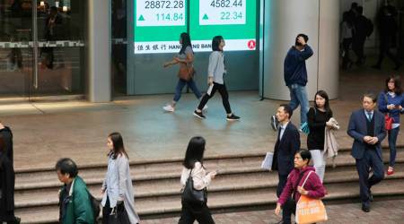 GLOBAL MARKETS - Asia shares consolidate, China cuts another interest rate, asina market news, global market news update, world market news update, business news india, indian express business news