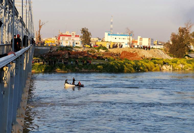 Ferry packed with Iraqis celebrating holiday sinks; 94 die