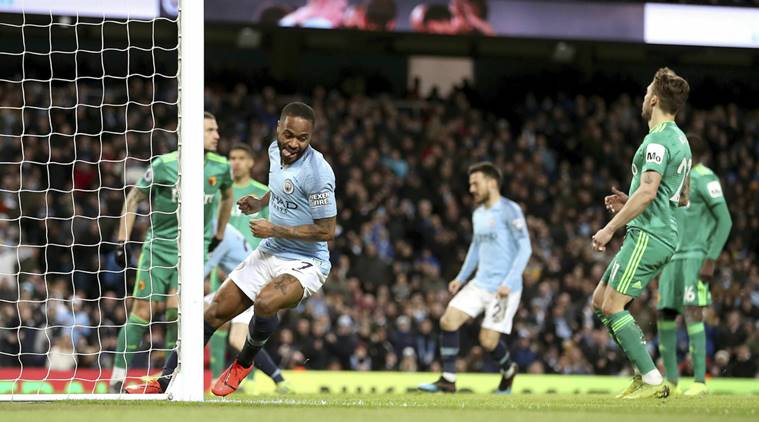 Manchester City's Raheem Sterling, center, celebrates scoring during the English Premier League soccer match between Manchester City and Watford at the Etihad Stadium, Manchester