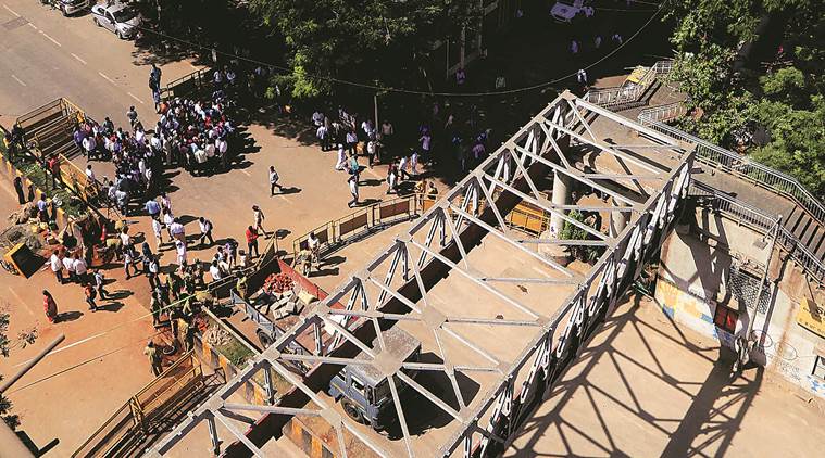 mumbai bridge collapse, mumbai overbridge collapse, overbridge collapse in mumbai, csmt bridge collapse, bmc, brihanmumbai municipal corporation, csmt foot overbridge, indian express news