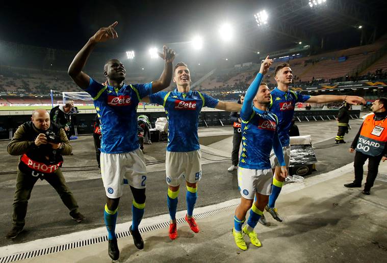 Napoli's Dries Mertens and team mates celebrate after the match