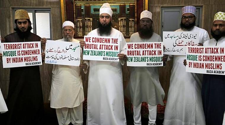 Indian Muslims hold placards during a condolence meeting and protest against Friday's mass shootings in New Zealand in Mumbai. (AP)