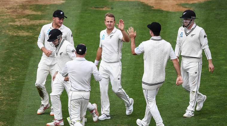 New Zealand players celebrate fall of wicket against Bangladesh in second Test