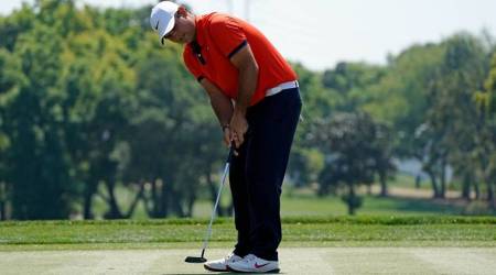 Patrick Reed putts on the ninth green during the first round of the Valspar Championship golf tournament at Innisbrook Resort - Copperhead Course.