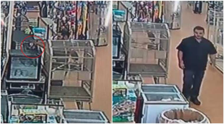 snake thief, man puts python in pants, robbery, bizarre, stolen python, cctv footage, Michigan, US, trending, indian express, indian express news