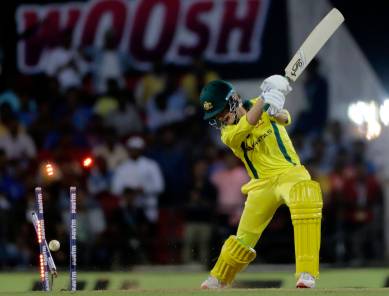 Australia's Adam Zampa is bowled by Vijay Shankar during the second one-day international cricket match between India and Australia in Nagpur, India