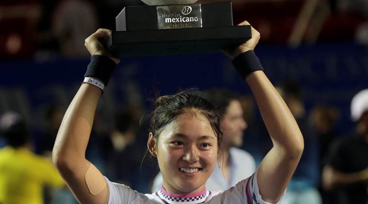 China's Wang Yafan celebrates winning the Acapulco Open with the trophy REUTERS