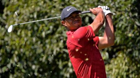 Tiger Woods plays his shot from the second tee during the final round of the WGC - Mexico Championship golf tournament at Club de Golf Chapultepec.
