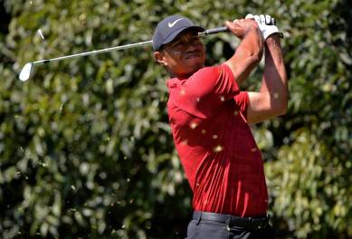 Tiger Woods plays his shot from the second tee during the final round of the WGC - Mexico Championship golf tournament at Club de Golf Chapultepec.