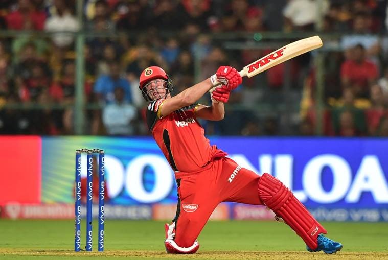 RCB batsman AB de Villiers plays a shot during the Indian Premier League 2019 (IPL T20) cricket match between Royal Challengers Bangalore (RCB) and Mumbai Indians (MI) at Chinnaswamy Stadium in Bengaluru