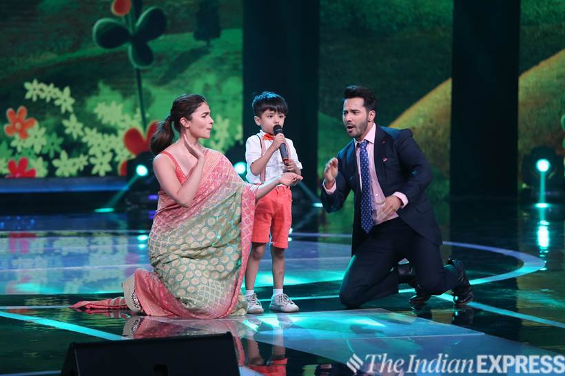 Actors Alia Bhatt and Varun Dhawan enjoying on contestant Swaramsh Tiwari's performance at Sa Re Ga Ma Pa Li'l Champs