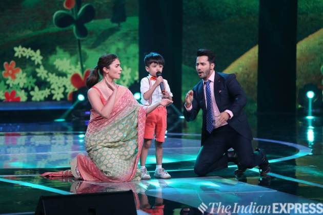 Actors Alia Bhatt and Varun Dhawan enjoying on contestant Swaramsh Tiwari's performance at Sa Re Ga Ma Pa Li'l Champs