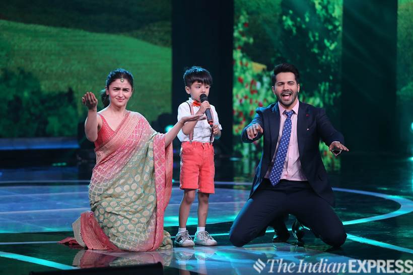 Actors Alia Bhatt and Varun Dhawan enjoying on contestant Swaramsh Tiwari's performance at Sa Re Ga Ma Pa Li'l Champs