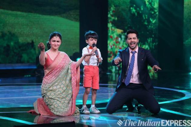 Actors Alia Bhatt and Varun Dhawan enjoying on contestant Swaramsh Tiwari's performance at Sa Re Ga Ma Pa Li'l Champs