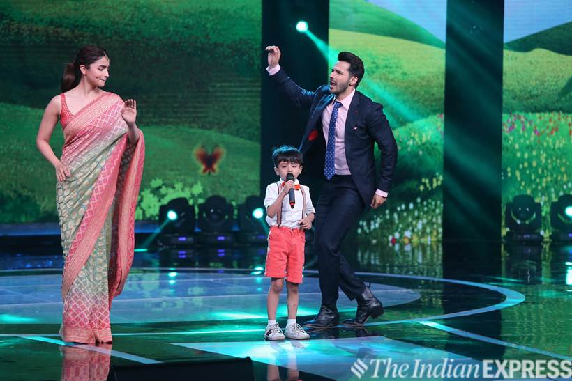 Actors Alia Bhatt and Varun Dhawan enjoying on contestant Swaramsh Tiwari's performance at Sa Re Ga Ma Pa Li'l Champs