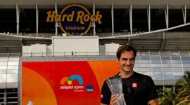 Roger Federer of Switzerland poses with the trophy after defeating John Isner of the United States (not pictured) during the men’s finals at the Miami Open at Miami Open Tennis Complex.