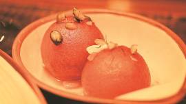 The menu features several authentic dishes from Arcot