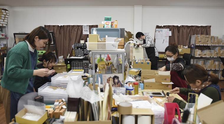A crew working to rush out orders of new stamps