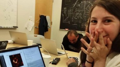 Dr Katie Bouman with a picture of the Black hole which was officially revealed yesterday