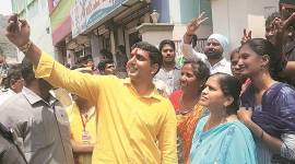 Andhra Pradesh, Lok sabha polls in andhra pradesh, lok sabha elections, Lokesh, n chandrababu naidu, son of n chandrabau naidu, tdp leader, chandrababu naidu, ap cm, andhra cm son, tdp campaign, selfie with lokesh, lok sabha elections 2019, election news, indian express
