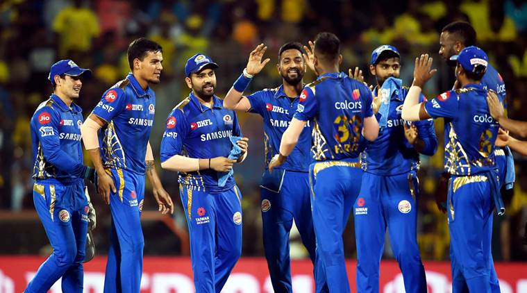 MI bowler Hardik Pandya celebrate with teammates for the wicket of CSK captain Suresh Raina during the Indian Premier League 2019 (IPL T20) cricket match between Chennai Super Kings (CSK) and Mumbai Indians (MI) at MAC Stadium in Chennai