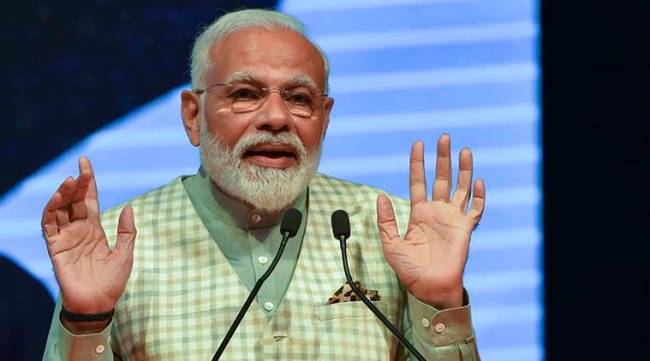 New Delhi: Prime Minister Narendra Modi addresses the 'Traders Sammelan' at Talkatora Stadium, in New Delhi, Friday, April 19, 2019. (PTI Photo/Kamal Kishore) (PTI4_19_2019_000147B)