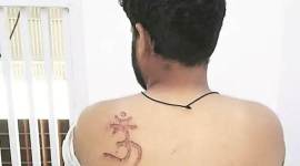 Muslim Om Muslim man om mark, Om tatoo on muslim man, om symbol burnt on muslim man, om symbol on muslim man, tihar jail, tihar jail undertrial