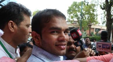 FIR against wrestler-turned-ACP Narsingh Yadav for campaigning for Congress