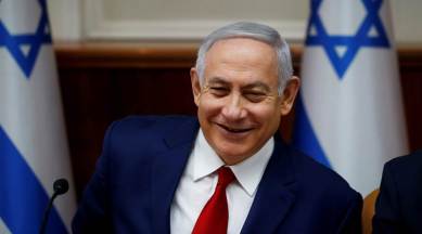 Israel strikes Gaza after rocket sirens force Netanyahu off stage