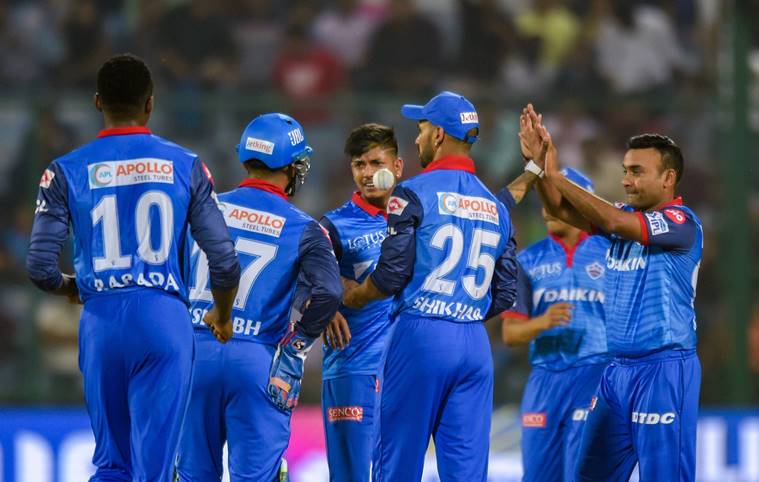 DC bowler Sandeep Lamichhane celebrates with teammates after taking wicket of KKR batsman Nikhil Naik (LBW) during the Indian Premier League 2019 (IPL T20) cricket match between Delhi Capital (DC) and Kolkata Knight Riders (KKR) at Feroz Shah Kotla Stadium