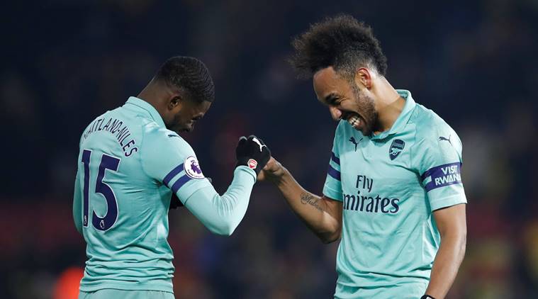 Arsenal's Pierre-Emerick Aubameyang and Ainsley Maitland-Niles celebrate after the match against Watford