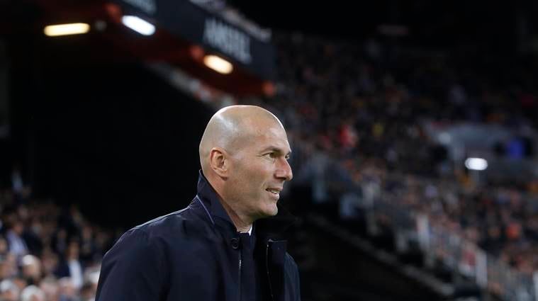 Real Madrid's coach Zinedine Zidane looks on prior of the Spanish La Liga soccer match between Valencia and Real Madrid at the Mestalla Stadium in Valencia, Spain