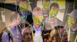 Attendees interact with a facial recognition demonstration during the Consumer Electronics Show in Las Vegas. Consumer Electronics Show